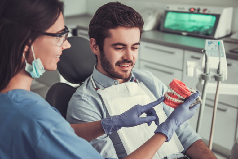 Unmasking the Benefits of Visiting a Dentist in Waterloo