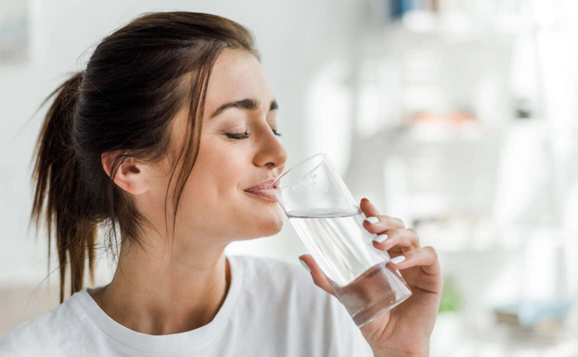 Celebrating Dental Smiles Month: How Regular Hydration Boosts Oral Health