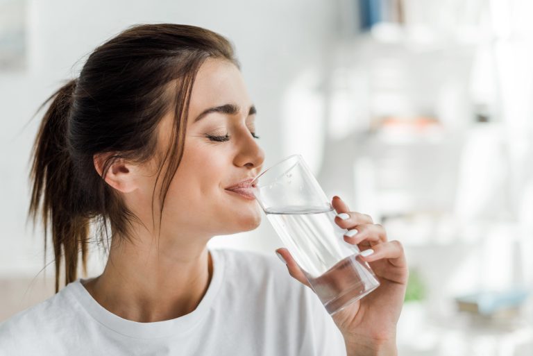 Celebrating Dental Smiles Month: How Regular Hydration Boosts Oral Health