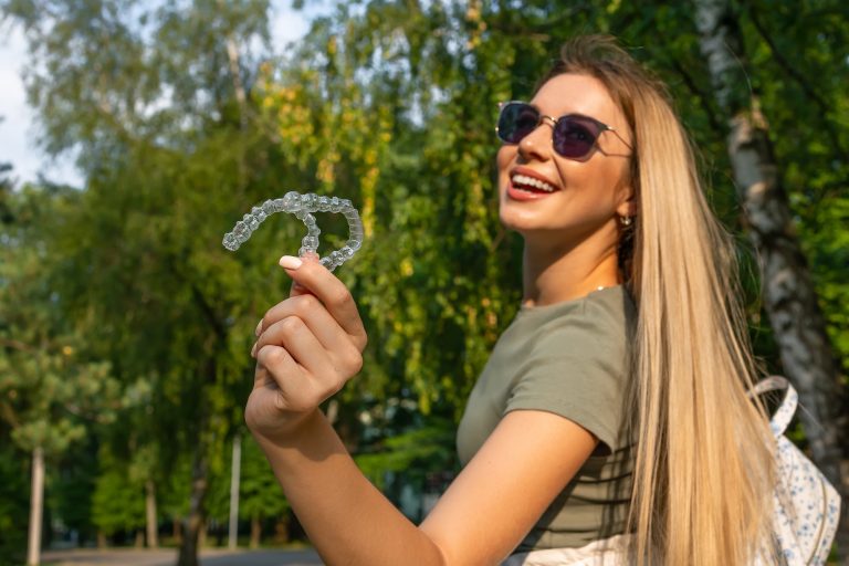 The “Invisible” Struggles: What to Know About Wearing Clear Aligners While Traveling, Dating, or Public Speaking